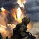 Battlefield 2042 specialists flee a launch site as the rocket explodes.